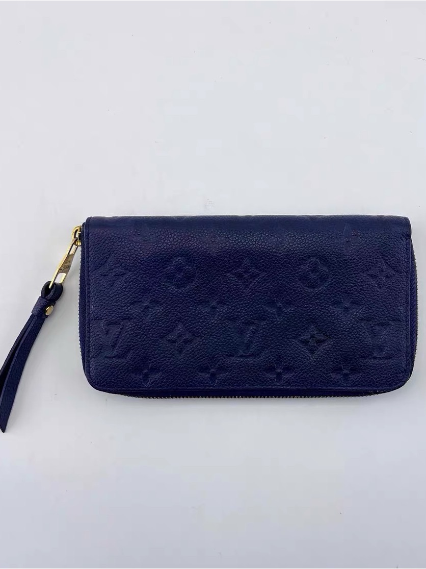 Louis Vuitton Dark Navy Embossed Monogram Zip Wallet With Wrist Strap
